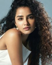 Beautiful Actress Anupama Parameswaran in a White Sleeveless Top with a Matching Flared Cotton Skirt Photos 04