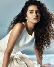 Beautiful Actress Anupama Parameswaran in a White Sleeveless Top with a Matching Flared Cotton Skirt Photos 05