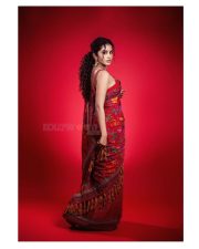 Beautiful Anupama Parameswaran in a Red Flower Printed Saree with Matching Sleevless Blouse Pictures 09