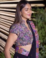 Beautiful Mrunal Thakur in a Black Georgette Saree with a Jacket Style Silk Blouse with a Deep V Neckline Pictures 02