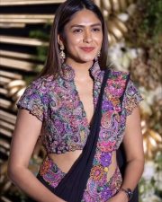 Beautiful Mrunal Thakur in a Black Georgette Saree with a Jacket Style Silk Blouse with a Deep V Neckline Pictures 04