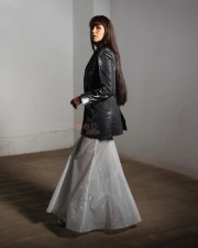 Beautiful Mrunal Thakur in a Black Metallic Jacket with a Silver Skirt Photos 06
