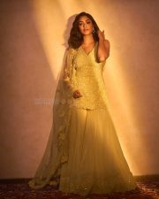 Beautiful Mrunal Thakur in a Yellow Sleeveless Sharara Set Photos 05