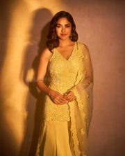 Beautiful Mrunal Thakur in a Yellow Sleeveless Sharara Set Photos 07