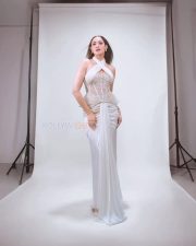 Beautiful Pragya Jaiswal in a White Corset Style Dress Photos 01