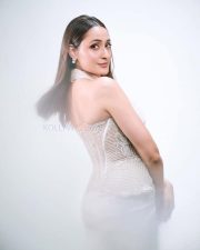 Beautiful Pragya Jaiswal in a White Corset Style Dress Photos 04