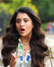 Beautiful Rashi Singh in a White Long Sleeved Floral Printed Shirt with Black Trousers Photos 01