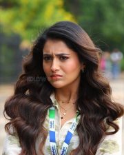 Beautiful Rashi Singh in a White Long Sleeved Floral Printed Shirt with Black Trousers Photos 02