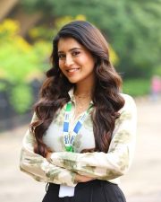 Beautiful Rashi Singh in a White Long Sleeved Floral Printed Shirt with Black Trousers Photos 03