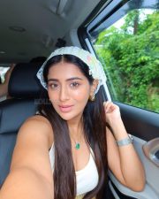 Beautiful Rashi Singh in a White Sleeveless Top and Yellow Gingham Skirt Pictures 03