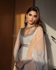 Beautiful Saiee Manjrekar in a White Anarkali at Arjun Son Of Vyjayanthi Movie Pre Release Event Photos 08