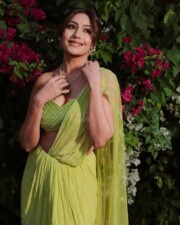 Beautiful Surbhi Chandna in an Ethnic Lime Green Saree Photos 03