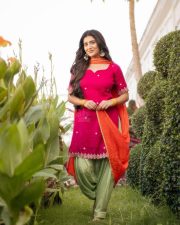 Beautiful Telugu Heroine Rashi Singh in a Rani Pink Kurta with Bright Green Patiala Style Salwar and Orange Dupatta Pictures 02