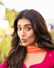 Beautiful Telugu Heroine Rashi Singh in a Rani Pink Kurta with Bright Green Patiala Style Salwar and Orange Dupatta Pictures 03