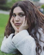Bhumi Pednekar Lying on the Grass Photos 01