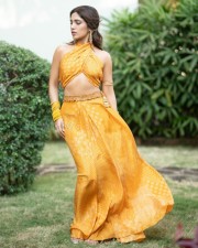 Bhumi Pednekar in a Yellow Halter Neck Crop Top and Maxi Skirt Photos 04