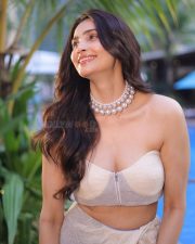 Bihu Attack Actress Daisy Shah in a Strapless Corset Blouse with a Matching Mesh Draped Skirt Photos 02
