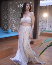 Bihu Attack Actress Daisy Shah in a Strapless Corset Blouse with a Matching Mesh Draped Skirt Photos 05