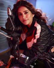 Biker Beauty Nabha Natesh in a Stylish Black Red and White Leather Jacket with a Black Sports Bra and Black Pant Photos 02