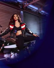 Biker Beauty Nabha Natesh in a Stylish Black Red and White Leather Jacket with a Black Sports Bra and Black Pant Photos 03