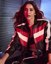 Biker Beauty Nabha Natesh in a Stylish Black Red and White Leather Jacket with a Black Sports Bra and Black Pant Photos 04