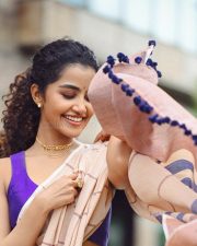 Bubbly Beauty Anupama Parameswaran in a Light Saree with a Sleeveless Purple Blouse Photos 04