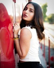 Captivating Actress Ananya Nagalla in a White Crop Top and Denim Shorts Photos 02