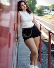 Captivating Actress Ananya Nagalla in a White Crop Top and Denim Shorts Photos 03