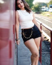 Captivating Actress Ananya Nagalla in a White Crop Top and Denim Shorts Photos 07
