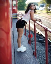 Captivating Actress Ananya Nagalla in a White Crop Top and Denim Shorts Photos 08