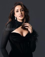 Captivating Actress Pragya Jaiswal in a Black Velvet Feather Cuff Gown Photos 03