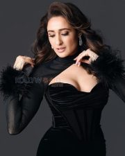 Captivating Actress Pragya Jaiswal in a Black Velvet Feather Cuff Gown Photos 08