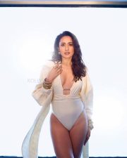 Captivating Pragya Jaiswal in a White Monokini Pictures 02