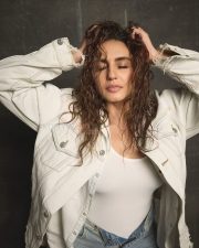 Casual Beauty Huma Qureshi in a White Tank Top and Oversized Denim Jacket Pictures 01