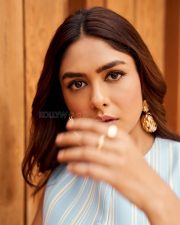 Charming Actress Mrunal Thakur in a Blue Striped Sleeveless Dress Photos 02