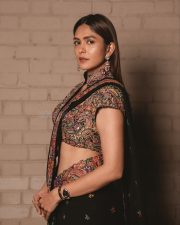Charming Actress Mrunal Thakur in a burgundy wine sheer traditional saree with draped pallu photos 01