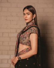 Charming Actress Mrunal Thakur in a burgundy wine sheer traditional saree with draped pallu photos 04