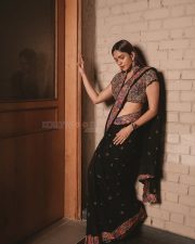 Charming Actress Mrunal Thakur in a burgundy wine sheer traditional saree with draped pallu photos 06