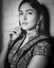 Charming Actress Mrunal Thakur in a burgundy wine sheer traditional saree with draped pallu photos 07