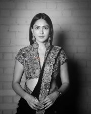 Charming Actress Mrunal Thakur in a burgundy wine sheer traditional saree with draped pallu photos 09