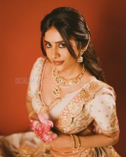 Charming Actress Nabha Natesh in a Ivory Embroidered Lehenga With Orange Accents Photos 03
