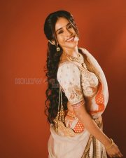 Charming Actress Nabha Natesh in a Ivory Embroidered Lehenga With Orange Accents Photos 04