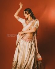 Charming Actress Nabha Natesh in a Ivory Embroidered Lehenga With Orange Accents Photos 05