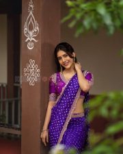 Charming Actress Nabha Natesh in a Purple Bandhani Saree Photos 06