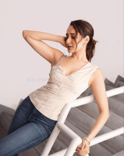 Charming Actress Pragya Jaiswal in a Ivory Embellished Corset Top And Jeans Photos 02