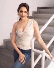 Charming Actress Pragya Jaiswal in a Ivory Embellished Corset Top And Jeans Photos 04