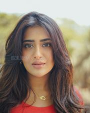 Charming Actress Rashi Singh in a Red Coral Crop Top And Button Skirt Photos 09