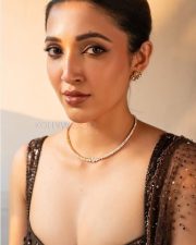 Charming Beauty Neha Shetty in a Golden Lehenga with Sleeveless Blouse Photos 02