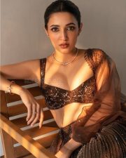 Charming Beauty Neha Shetty in a Golden Lehenga with Sleeveless Blouse Photos 03