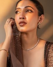 Charming Beauty Neha Shetty in a Golden Lehenga with Sleeveless Blouse Photos 04